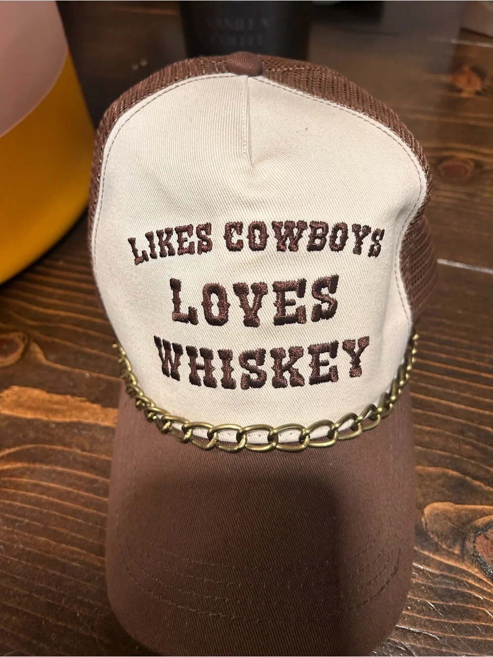 ‘Likes Cowboys Loves Whiskey' Chain Trucker Hat
